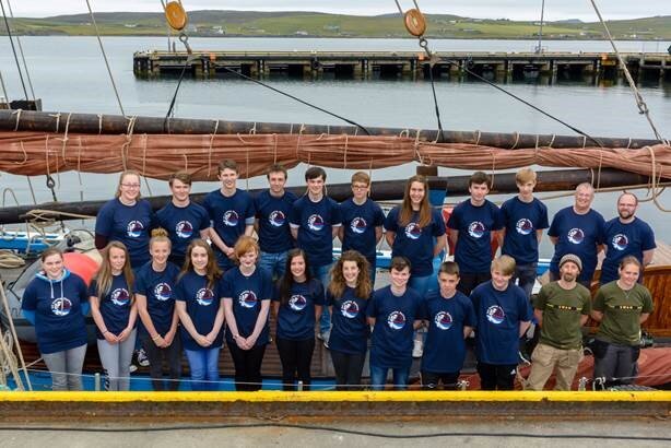 2018 ‘Swan’ trainees pictured L-R, Back Row; Louise Cluness, Reuben Robertson, Cormac Mathieson, Finn Rivett, Leighton Anderson, Dylan Black, Emma Sandison, Benjamin Hamer, Hal MacLennan, John Dally (Chaparone/Crew – Race One) and Shaye McLeod (Chaparone/Crew- Cruise-in-Company). Front Row; Elizabeth Tregonning, Zoe Rivett, Melody Goodlad, Abigail Howard, Rosalin Beattie, Lori Smith, Rachel Dorrat, Joe Wadley, Jay Milne, Leighton Sutherland, Thorben Reinhardt (Swan Skipper) and Maggie Adamson (Swan Mate).