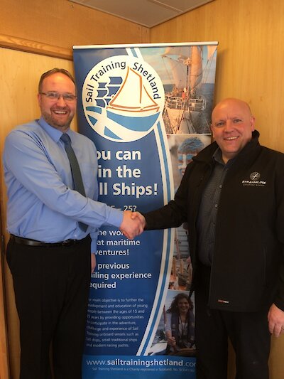 Victor Sandison of Sail Training Shetland and Brian Johnston from Streamline Shipping Group.