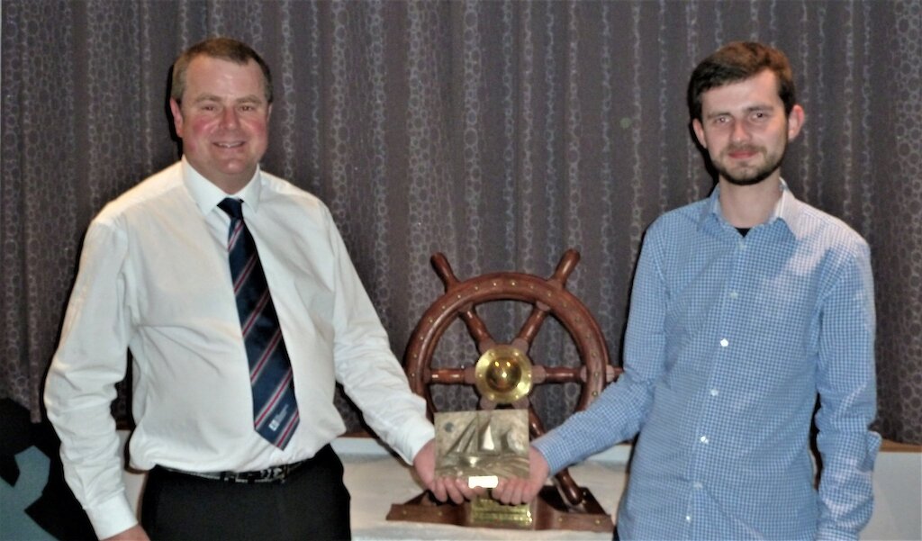 Fishmern's Mission Superintendent Aubrey Jamieson, presenting the Vevoe Trophy to Drew Manson, Sail Trainee of the Year