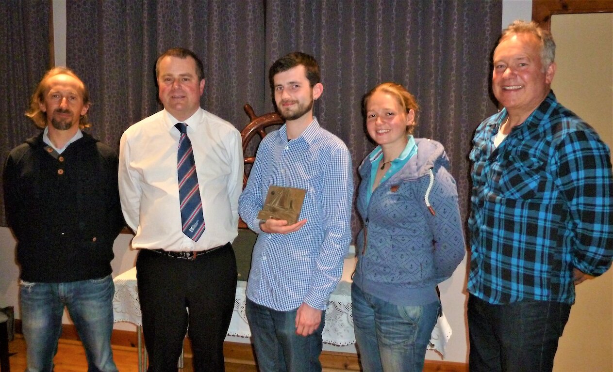 From left to right:- Swan Skipper, Thorben Reinhardt; Aubrey Jamieson; Drew Manson; Swan Mate Maggie Sandison and Swan Trust Operations Committee Chairman, Tommy Allan.