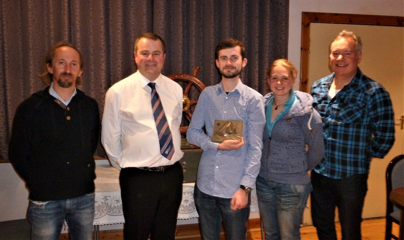 From left to right:- Swan Skipper, Thorben Reinhardt; Aubrey Jamieson; Drew Manson; Swan Mate Maggie Sandison and Swan Trust Operations Committee Chairman, Tommy Allan.
