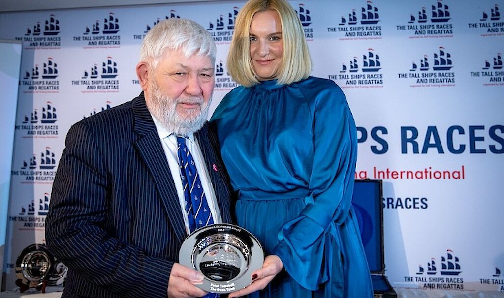 Peter receiving his Award from Magda Makowska. Credit: Sail Training International, Kris Romanski