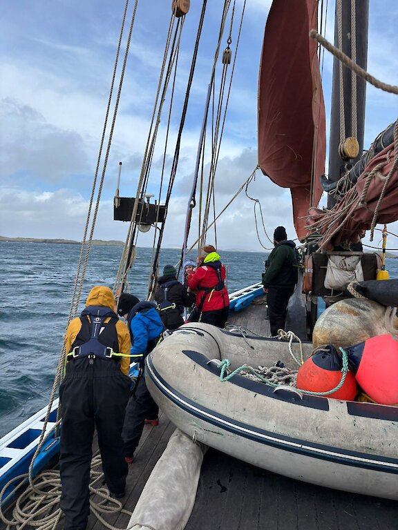 Sail Trainees raising the sails